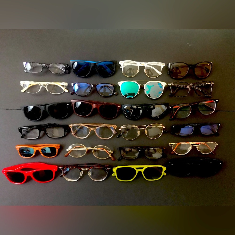 24 pairs of assorted glasses and sunglasses frames. Multiple brands.